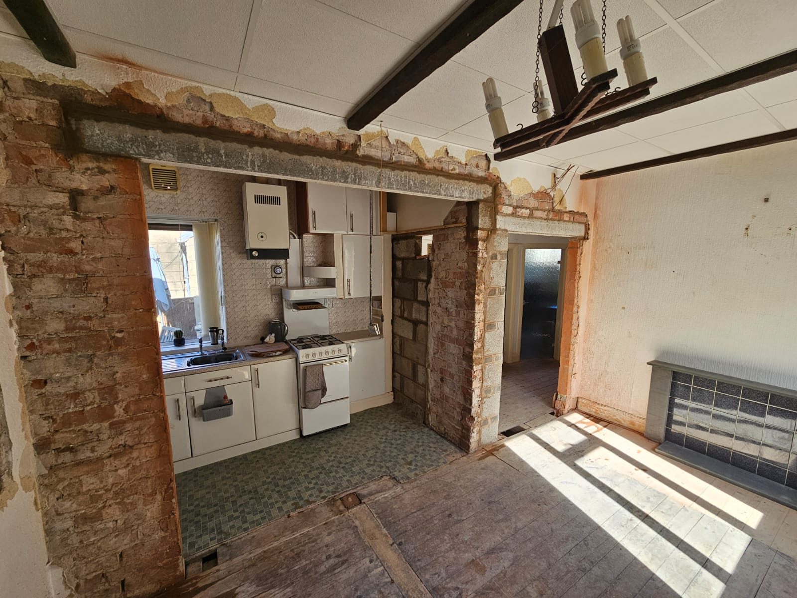 Internal structural opening — RSJ installed between kitchen and living room