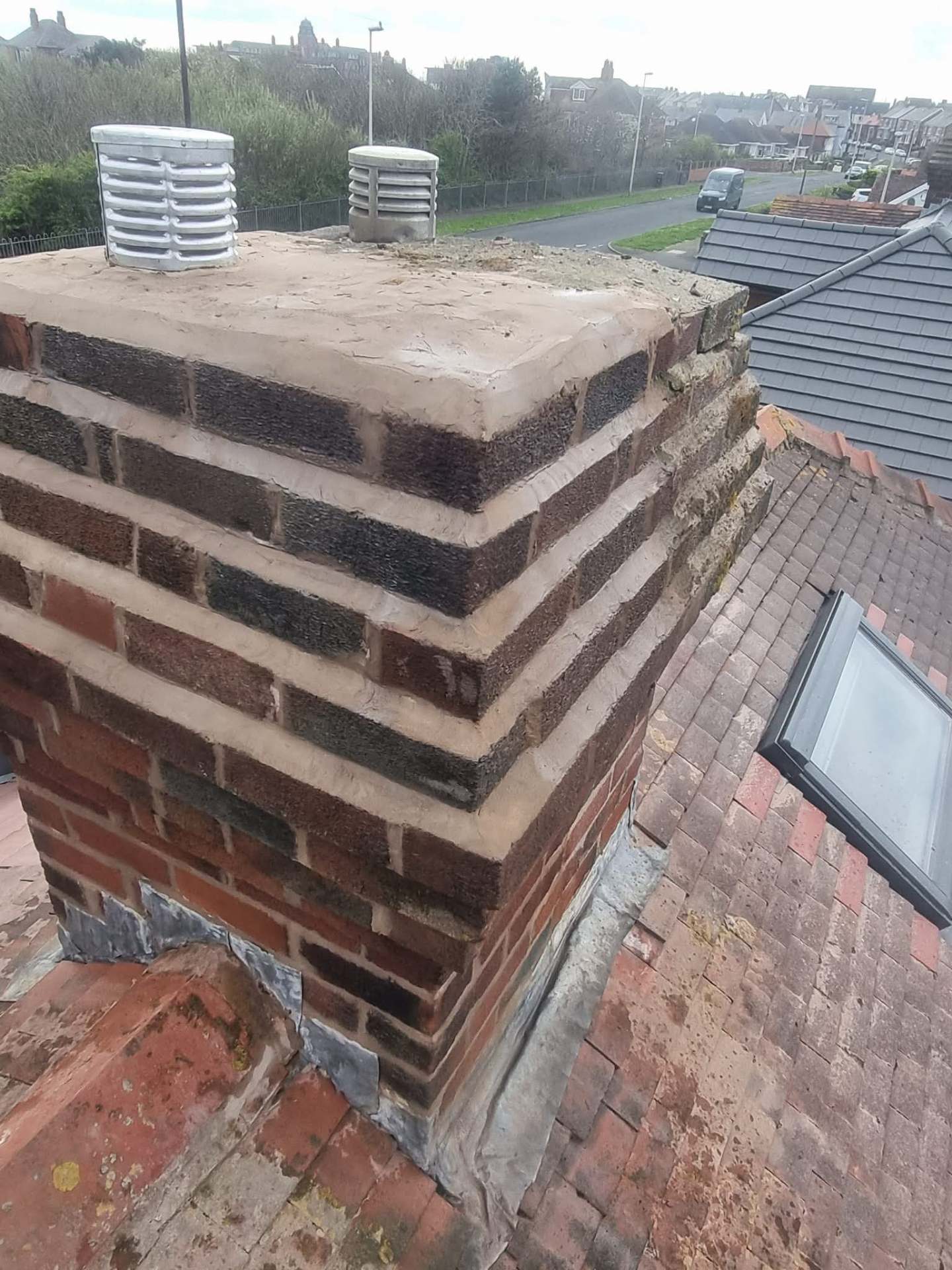 Chimney rebuild & re-flaunching with fresh leadwork