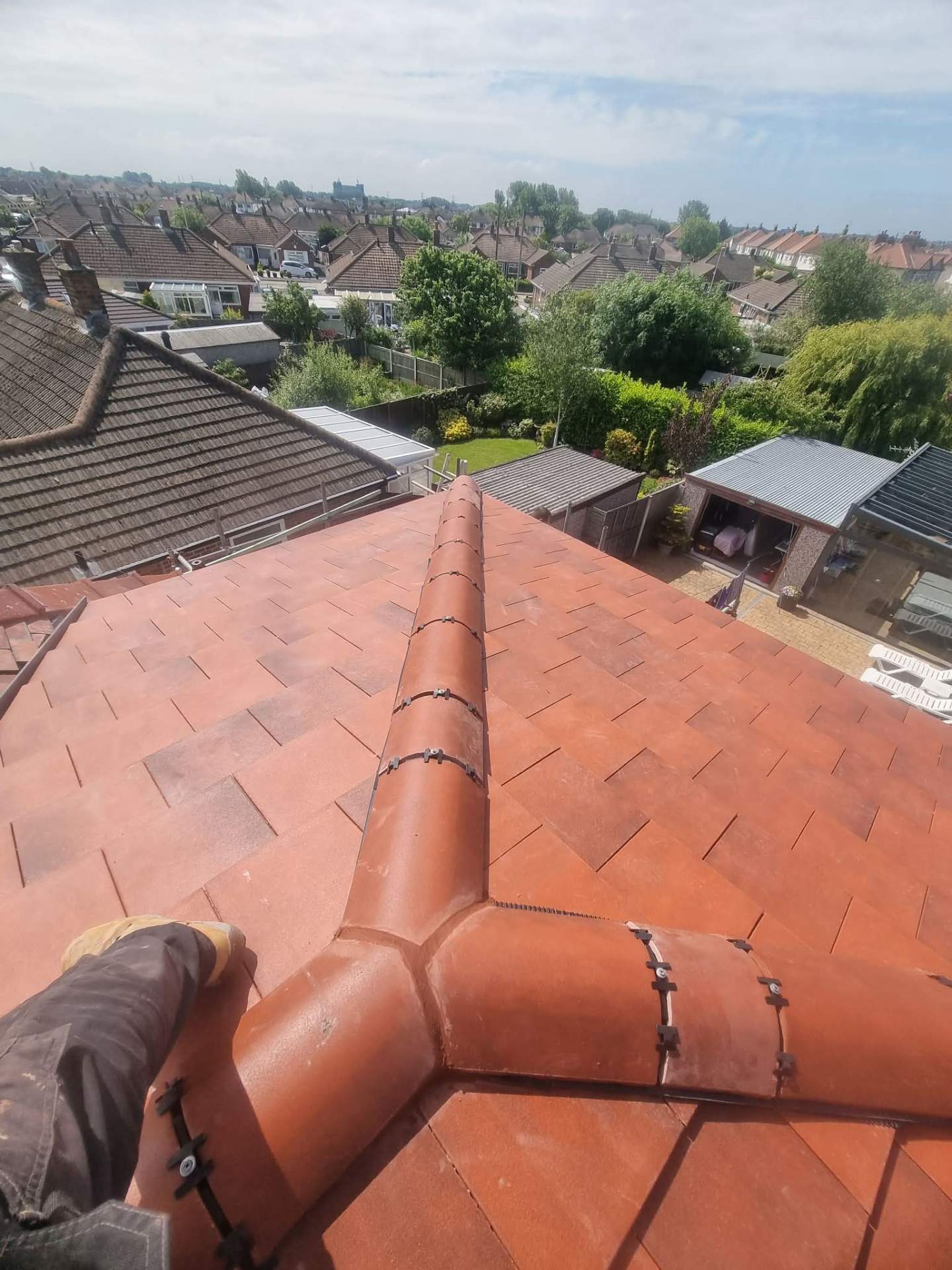 New clay tile roof with ridge & hip details
