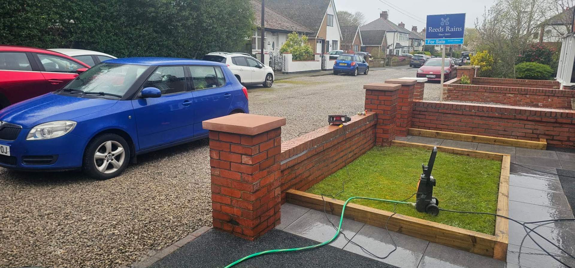 New brick boundary walls, paving & landscaping