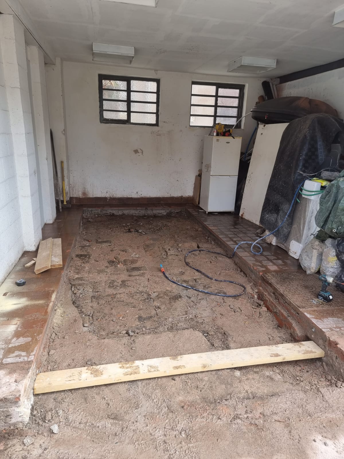Existing garage floor excavated ready for new concrete slab
